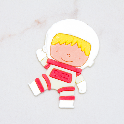 Multiple astronaut chocolates in different colors