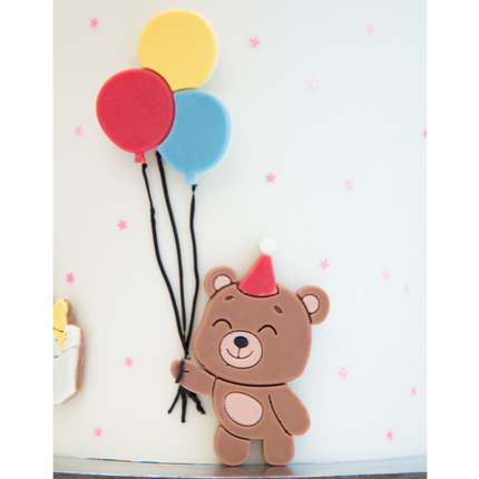 Finished chocolate party bears in various colors balloons