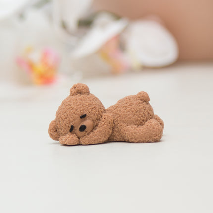 fondant 3D sleeping fuzzy bear topper made with silicone mold 