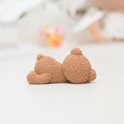 Chocolate 3D sleeping fuzzy bear topper made with silicone mold back