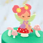 Fairy-themed cake decorated with handmade topper